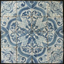 Tilepanel decorated with flower motivs and ribbons